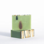 A stack of handmade Avocado Soap with Cocoa and Activated Charcoal.