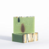 A stack of handmade Avocado Soap with Cocoa and Activated Charcoal.