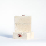 Salt soap stack with seaweed dividing line topped with chunky Himalayan salt.