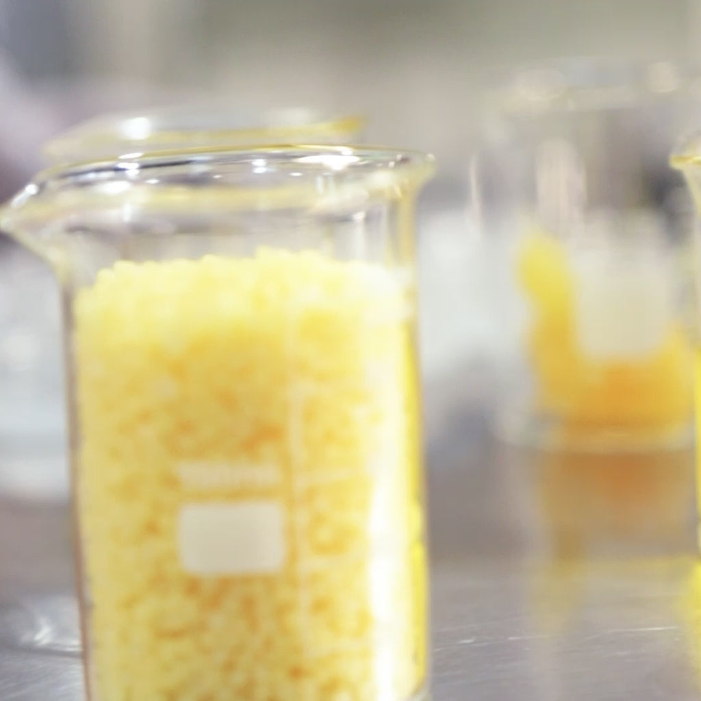 A video of Santo Cabo staff making lip balm by hand.