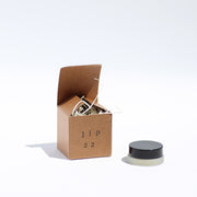 A video of Santo Cabo staff making lip balm by hand.