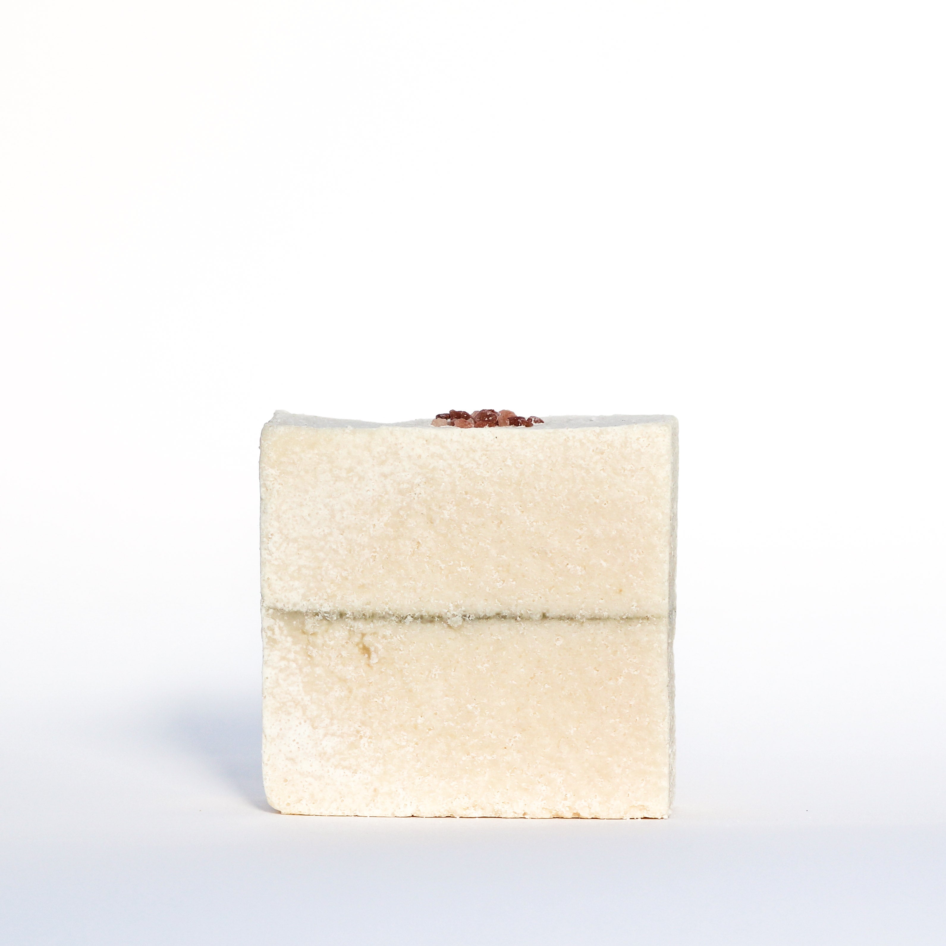 Salt soap with seaweed dividing line with topped Himalayan salt.